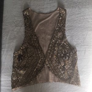 Sleeveless sequined jacket